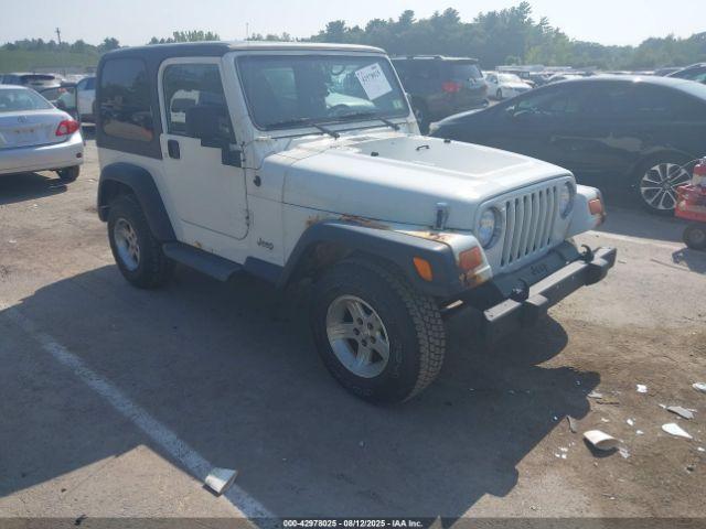  Salvage Jeep Wrangler
